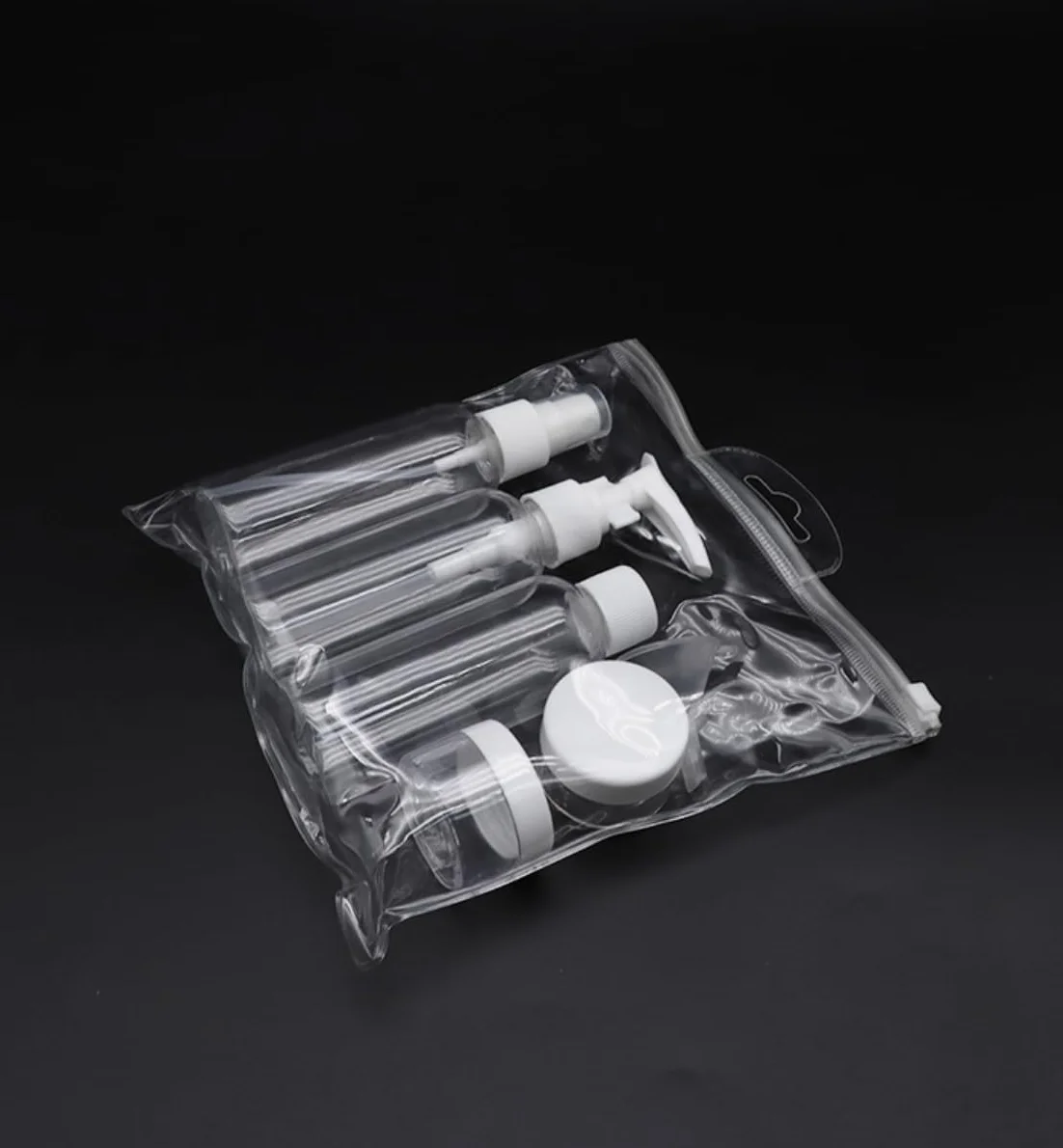Trousse de Toilette Transparente Kit Voyage Avion 100ml Flacons Rechargeables Silicone Anti-Fuite